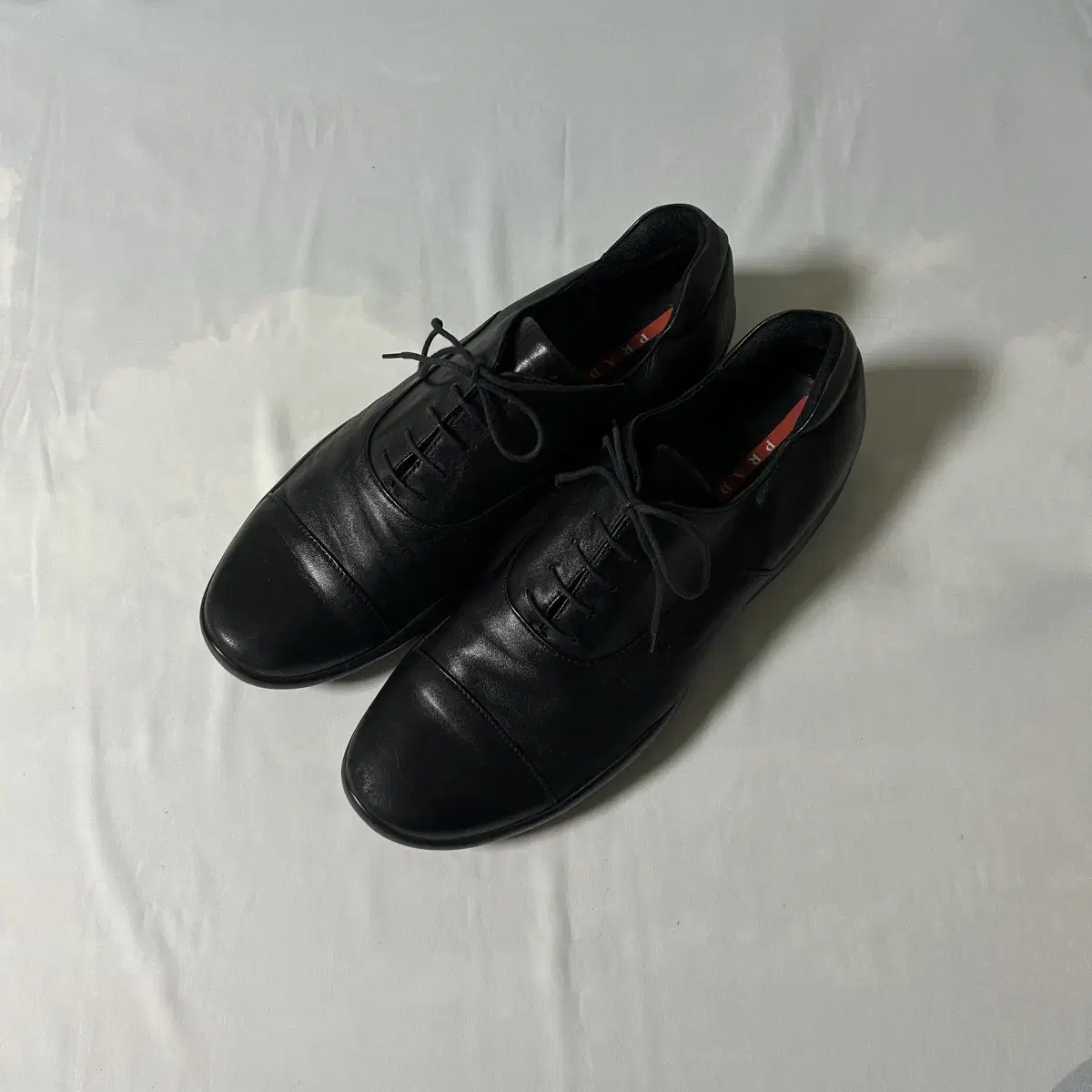 Prada sports cap toe derby shoes